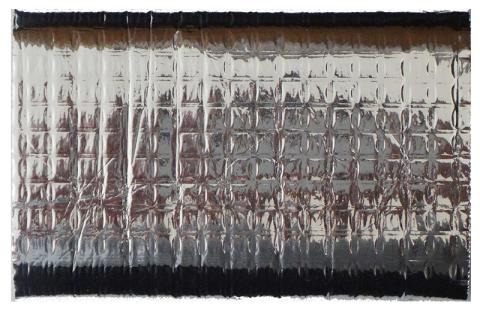 断熱シートでSSDを包む(中にSSDが入っています)