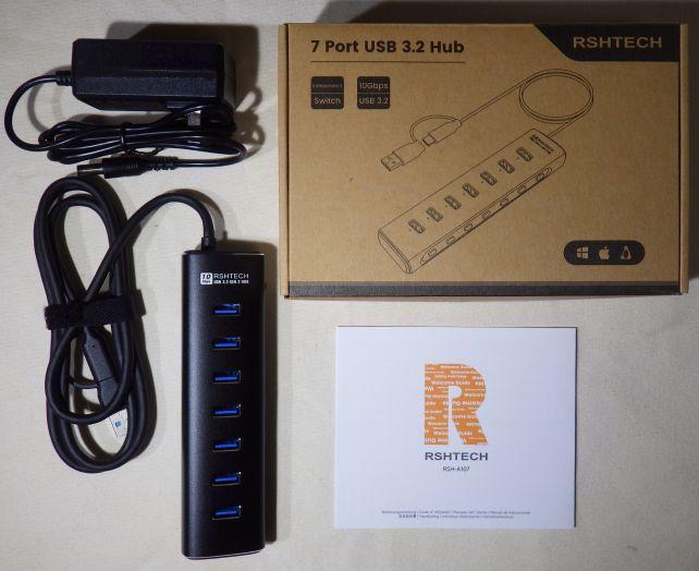 内容物とハブ本体とセルフパワー給電用のACアダプター、説明書