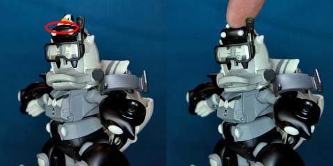 頭頂部を押すと口が開く