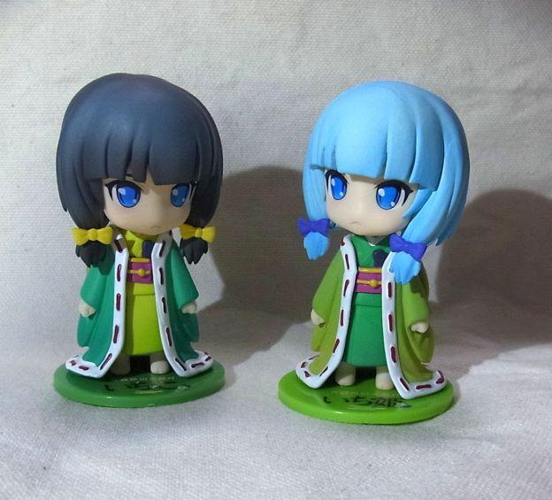 髪の毛とリボンの差と着物と羽織の色合いが逆転している。