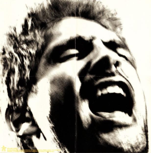 新聞印刷のような粗い粒子でイマイチ全体像が掴めないジャケットは広げると「口」