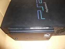 取り付けます。取り付け後は、ネットワークアダプタのマイナスネジをしめます。